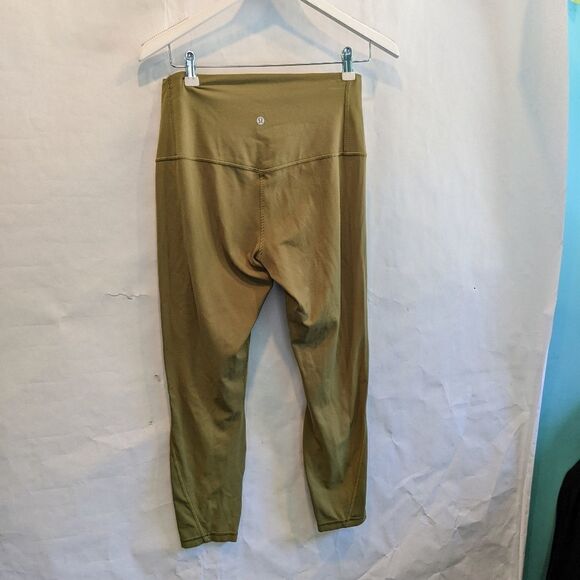 𝅺LULULEMON Unlimit High Rise Tight Bronze Green size 10 in EUC - Picture 10 of 10